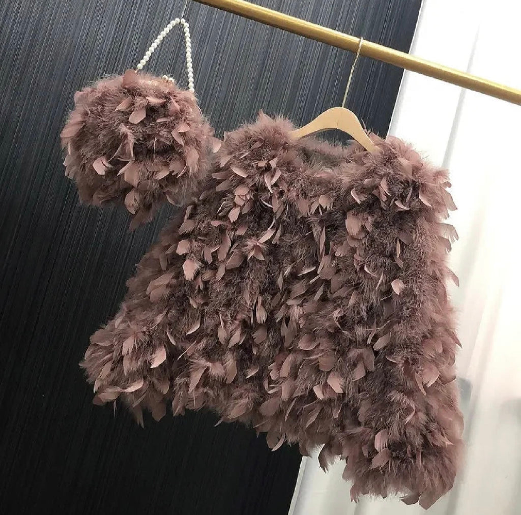 Pelliccia&Borsa Pavoneggiante