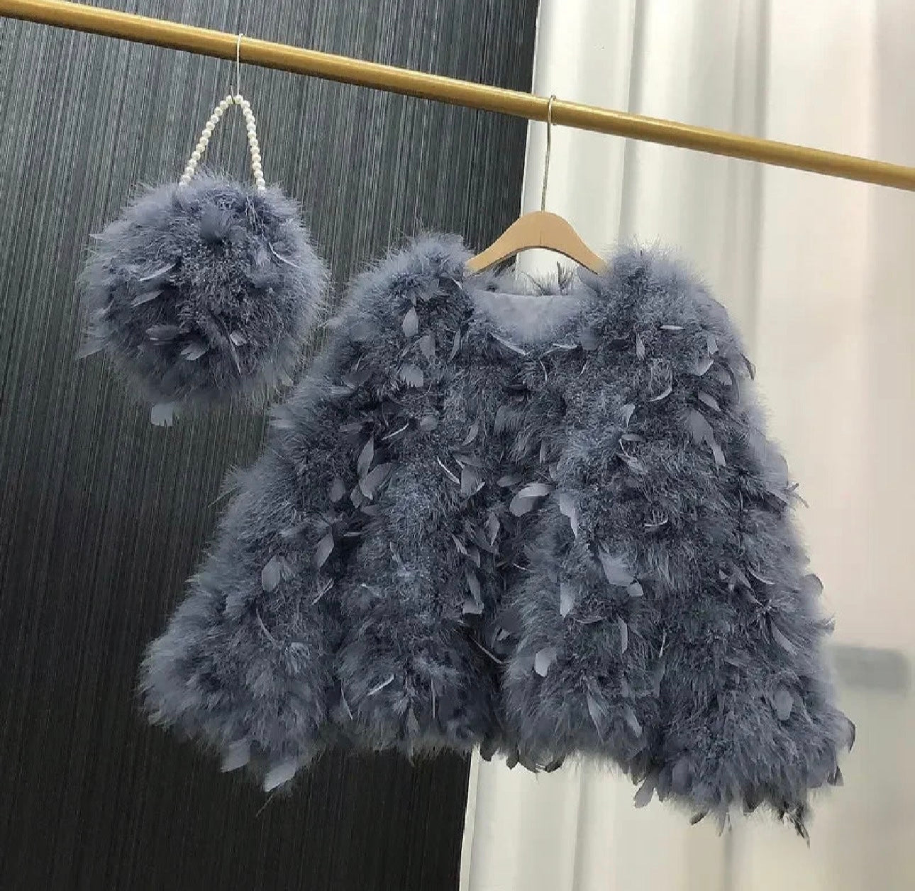 Pelliccia&Borsa Pavoneggiante