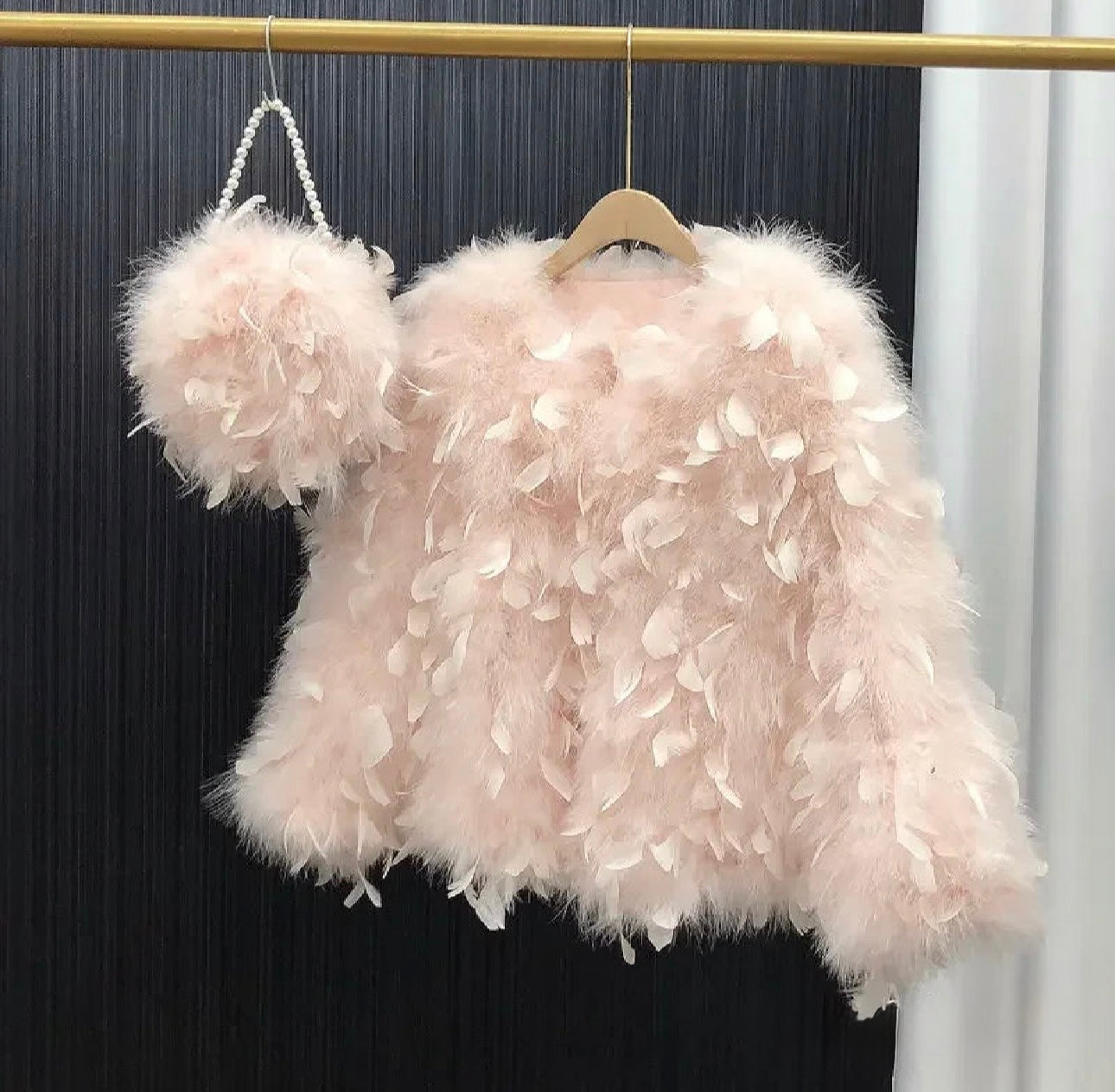 Pelliccia&Borsa Pavoneggiante