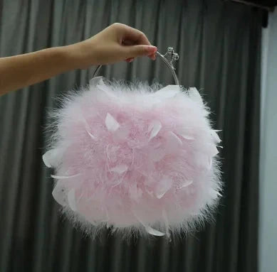 Pelliccia&Borsa Pavoneggiante