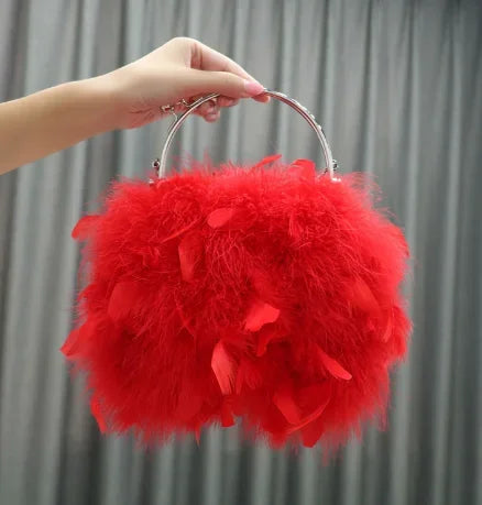 Pelliccia&Borsa Pavoneggiante