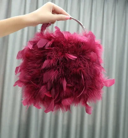 Pelliccia&Borsa Pavoneggiante