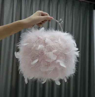 Pelliccia&Borsa Pavoneggiante