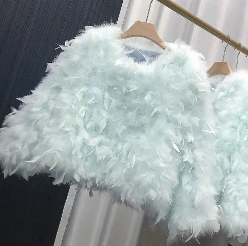 Pelliccia&Borsa Pavoneggiante