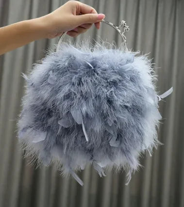 Pelliccia&Borsa Pavoneggiante