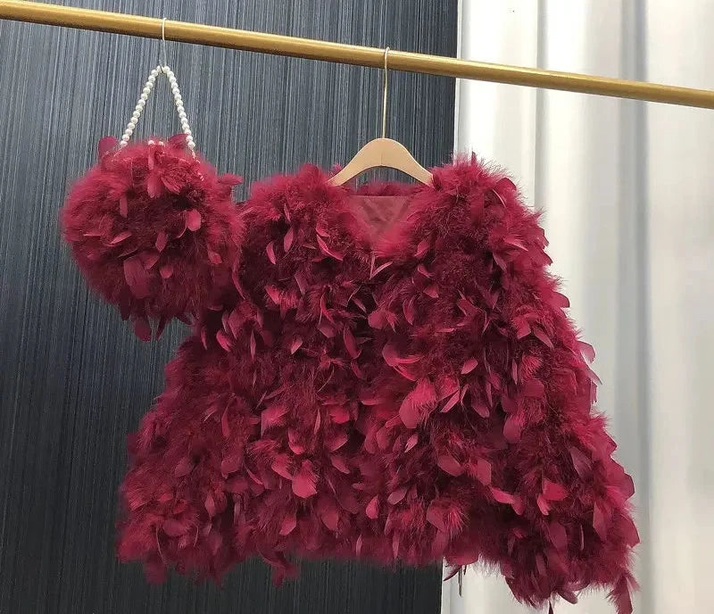 Pelliccia&Borsa Pavoneggiante